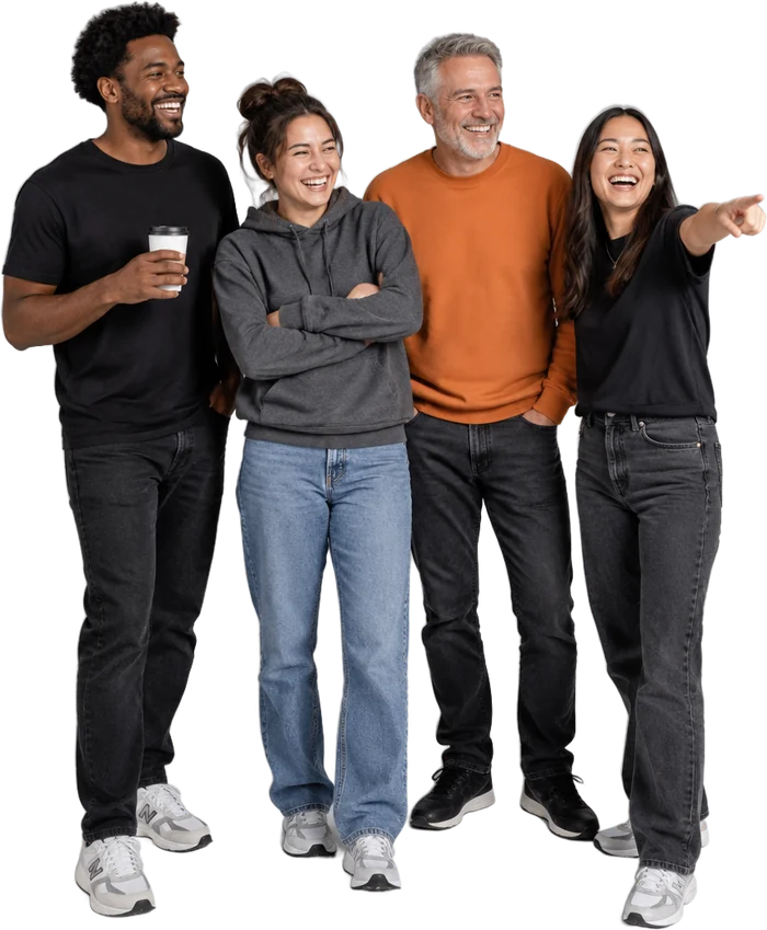 Four colleagues laughing together